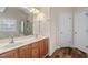 Bathroom with double vanity and wood-look flooring at 7 Starwood Ln, Durham, NC 27712