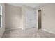 Bedroom with closet and wall to wall carpet at 7 Starwood Ln, Durham, NC 27712