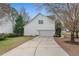 Attached two-car garage with driveway at 7 Starwood Ln, Durham, NC 27712