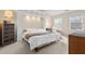Serene main bedroom featuring a king bed, soft lighting, and ample closet space for a relaxing retreat at 7 Starwood Ln, Durham, NC 27712