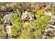 Stunning aerial view showcasing a distinguished home surrounded by lush greenery and mature trees at 81517 Alexander, Chapel Hill, NC 27517