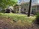 Expansive backyard featuring well-manicured lawn and large patio at 81517 Alexander, Chapel Hill, NC 27517