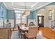 Elegant dining room featuring hardwood floors, decorative lighting, and beautiful trimwork throughout the space at 81517 Alexander, Chapel Hill, NC 27517