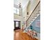 Grand foyer with decorative glass front door, high ceilings, chandelier and hardwood floors at 81517 Alexander, Chapel Hill, NC 27517
