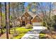Beautiful brick home with well-maintained lawn and a curved driveway at 81517 Alexander, Chapel Hill, NC 27517
