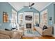 Cozy living room with vaulted ceilings, fireplace, and plenty of natural light at 81517 Alexander, Chapel Hill, NC 27517