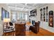 Inviting living room showcasing a fireplace, hardwood floors, and stylish decor at 81517 Alexander, Chapel Hill, NC 27517