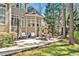 Outdoor patio with beautiful backyard, seating area, and well-maintained landscaping at 81517 Alexander, Chapel Hill, NC 27517