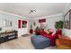 Bright living room with neutral walls and comfortable seating area at 817 Roanoke Dr, Cary, NC 27513