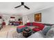 Open-concept living room with hardwood floors, neutral tones and comfortable seating at 817 Roanoke Dr, Cary, NC 27513