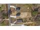 Aerial view of multiple home sites with new homes, driveways, and spacious lots at 1019 Thompson Rd, Four Oaks, NC 27524
