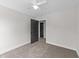 A clean bedroom features light-colored walls and a ceiling fan at 1019 Thompson Rd, Four Oaks, NC 27524