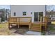 Wide shot of wooden deck with stairs at 1019 Thompson Rd, Four Oaks, NC 27524