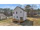 Back view of the two-story house showing the deck at 1019 Thompson Rd, Four Oaks, NC 27524
