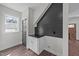 This is a bonus room with a small bar area with white cabinets and a dark countertop at 1019 Thompson Rd, Four Oaks, NC 27524