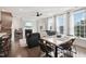 Spacious living area with a fireplace, sectional sofa, and large windows providing ample natural light at 10320 Sablewood Dr # 107, Raleigh, NC 27617