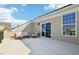 Rooftop deck with outdoor seating, large window, and a sliding glass door. A perfect space for relaxing and entertaining at 10320 Sablewood Dr # 107, Raleigh, NC 27617