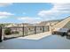 Spacious rooftop deck featuring an outdoor seating area with beautiful views of the surrounding neighborhood on a sunny day at 10320 Sablewood Dr # 107, Raleigh, NC 27617