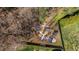 Aerial view of a backyard patio with a fire pit and interesting landscaping at 1046 Lawrence Rd, Wake Forest, NC 27587