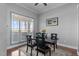 Cozy dining area featuring natural light, complete with stylish decor and hardwood floors at 1046 Lawrence Rd, Wake Forest, NC 27587