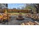 Outdoor fire pit area with seating and a gravel surround, ideal for entertaining at 1046 Lawrence Rd, Wake Forest, NC 27587