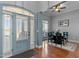Welcoming foyer with a view of the dining area, showcasing elegant hardwood floors at 1046 Lawrence Rd, Wake Forest, NC 27587
