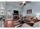 Bright living room with vaulted ceiling, fireplace, and plush seating arrangement at 1046 Lawrence Rd, Wake Forest, NC 27587