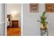 Tastefully decorated bedroom featuring a comfortable bed, nightstand, and artwork, offering a tranquil retreat at 10511 Rosegate Ct # 203, Raleigh, NC 27617