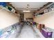Spacious garage interior with ample shelving for organizing and storage at 10511 Rosegate Ct # 203, Raleigh, NC 27617