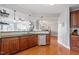 Modern kitchen featuring stainless steel appliances, dark wood cabinetry and breakfast bar seating at 10511 Rosegate Ct # 203, Raleigh, NC 27617