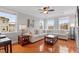 Spacious living room with bright windows and plush seating, perfect for relaxation at 10511 Rosegate Ct # 203, Raleigh, NC 27617