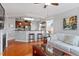 Cozy living room with comfortable seating and a view of the kitchen, perfect for entertaining guests at 10511 Rosegate Ct # 203, Raleigh, NC 27617