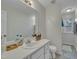 Bathroom with white countertops and a large mirror at 1107 Goldendale Dr, Durham, NC 27703