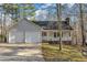 Charming one story home with a two-car garage, covered porch, and well-maintained landscaping at 1107 Goldendale Dr, Durham, NC 27703