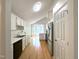 Kitchen with stainless steel appliances, recessed lighting, and hardwood floors at 1107 Goldendale Dr, Durham, NC 27703