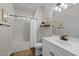 Clean bathroom featuring a shower with tub, with single sink vanity at 113 Pony Dr, Louisburg, NC 27549