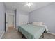 Bedroom with carpet, ceiling fan, and closet at 113 Pony Dr, Louisburg, NC 27549