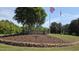 Stone sign and landscaping welcomes you to beautiful Lake Royale at 113 Pony Dr, Louisburg, NC 27549