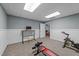 Bright home gym with exercise equipment, natural light, and carpeted floors at 113 Pony Dr, Louisburg, NC 27549