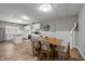 Open kitchen featuring white cabinets, wooden countertops, and dining area at 113 Pony Dr, Louisburg, NC 27549