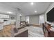 Spacious living room with an open-concept layout and modern finishes at 113 Pony Dr, Louisburg, NC 27549