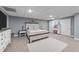 Large primary bedroom featuring neutral tones, carpeted floor, and closet space at 113 Pony Dr, Louisburg, NC 27549
