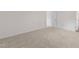 Bedroom with carpet flooring and a view of the hallway at 1152 Solace Way, Rolesville, NC 27571