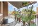 Cozy balcony with furniture and potted plants with an awning at 117 S Bloodworth St, Raleigh, NC 27601