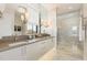 Modern bathroom with double sink vanity, and marble tiled shower at 117 S Bloodworth St, Raleigh, NC 27601