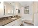 Bathroom with stone countertop and a shower/tub combo at 117 S Bloodworth St, Raleigh, NC 27601