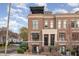 Charming brick townhome with a rooftop deck and curb appeal at 117 S Bloodworth St, Raleigh, NC 27601