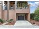 Exterior of the home with a one car garage and small garden area at 117 S Bloodworth St, Raleigh, NC 27601