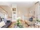 Elegant living room with hardwood floors, a staircase, and neutral walls at 117 S Bloodworth St, Raleigh, NC 27601