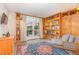Cozy living room featuring built-in bookshelves and a comfortable armchair at 117 S Bloodworth St, Raleigh, NC 27601